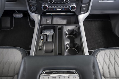 The all-new F-150 features and an available stowable shifter that easily folds into the center console of the all-new F-150 with the push of a button and allows full access to the large Interior Work Surface when in park.