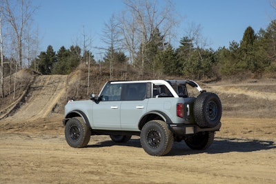 The four-door 2021 Bronco will have available removeable modular roof sections – left and right front panels, a full-width center panel and a rear section. Roof panels on both two- and four-door models can be easily removed by unlocking the latches from the interior to provide the largest overall open-top view in its class to take in the sunshine or to gaze at the stars at night. (Prototype not representative of production vehicle.)