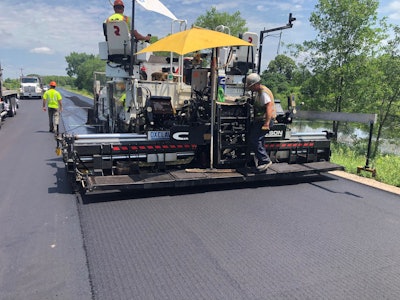 Valley Paving uses the Oxclaw screed plates and Bullox attachment system while paving County Road 8 in Scott County, Minnesota.
