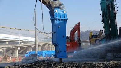 Okada Top 1000J 2 hydraulic hammer excavator