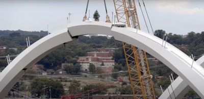 The last piece to the last arch for the new Frederick Douglass Memorial Bridge is placed. Photo credit: DDOT