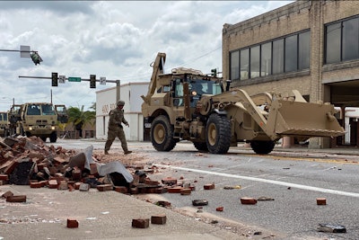 Engineer work teams with the 843rd Engineer Co. of the Louisiana National Guard clear debris from roadways in Lake Charles. Photo credit: Louisiana National Guard