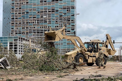 Engineer work teams with the 843rd Engineer Co. clear debris from roadways in Lake Charles during the aftermath of Hurricane Laura. The Louisiana National Guard has 17 teams across the state assisting local and state agencies. Photo credit: Louisiana National Guard
