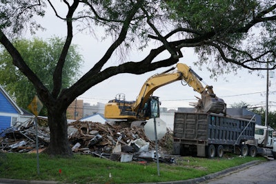 front end loader emptying hurricane debris