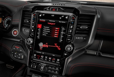 2021 Ram 1500 TRX is the company’s most technologically advanced pickup yet. 12-inch display shows sport drive mode.