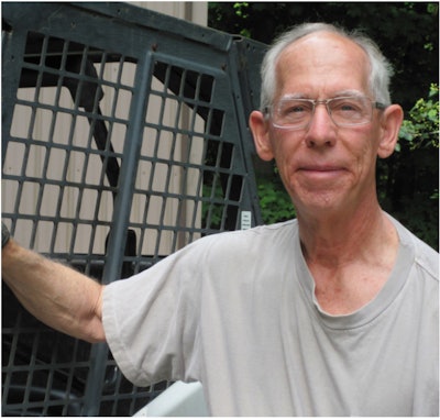 Jim Carter with antique construction equipment