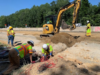 Researchers install sensors on a future lane for a widened I-64 in York County, Virginia. Photo credit: Virginia DOT