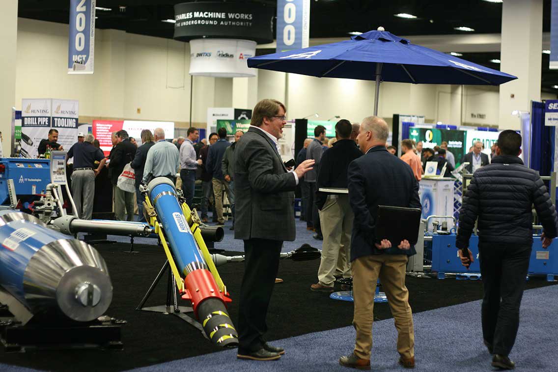 UCT EXHIBIT-HALL-NETWORKING-TT-TECH-UCT-BANNER-DR-JOHN2