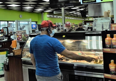 As with the social-distancing notification above, patrons of the deli are required by Virginia’s statewide mandate to wear masks indoors, as is the case throughout the stop.