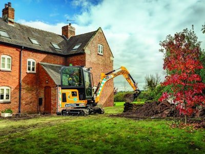 JCB 19C-1E’s new cab now makes it an all-weather machine.