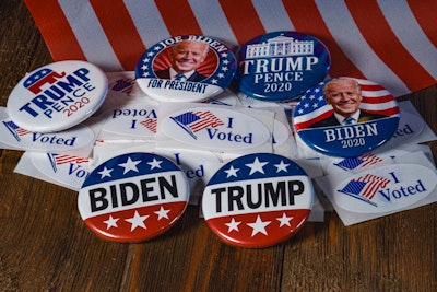 biden and trump presidential election pins with 'I voted' stickers