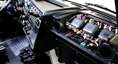 Passenger side electrical fuse boxes provide easy access.