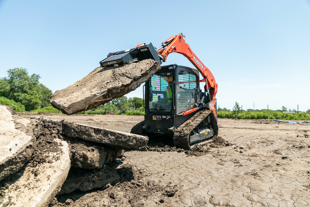 Kubota CC30 Concrete claw attachment on skid steer