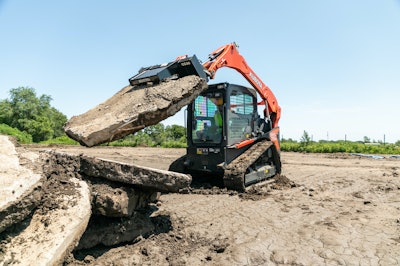 Kubota CC30 Concrete claw attachment on skid steer