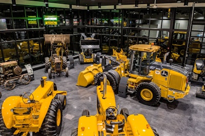 West Side Tractor’s showroom — which features antique equipment alongside new machines — is envisioned as both a draw into the dealership and an event space.