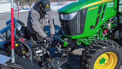SnowEx Automatixx attachment on john deere tractor