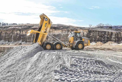 E-II Series trucks from John Deere feature redesigned dump bodies. The new design is wider and lower with a level rail height and angled bin rail for improved material retention. An optional ejector body is available for the 460E-II. Ejector dumps offer safety benefits but also allow more controlled spreading of bin contents with the truck in motion.