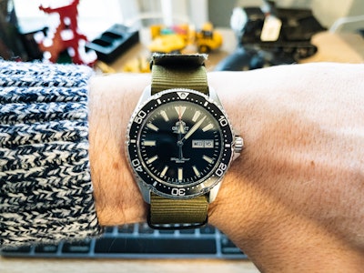 My Orient Kamasu on an army green NATO strap.