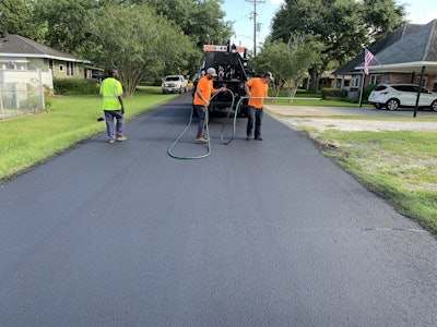Material Resources crew on Onyx-treated road