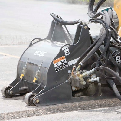 Edge cold planer in use