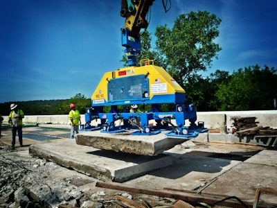 Vacuworx RC Series vacuum lifter being used with the company's Octapad lifting system to lift concrete slabs