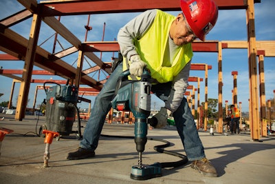 Worker using Bosch ProFactor rotary hammer