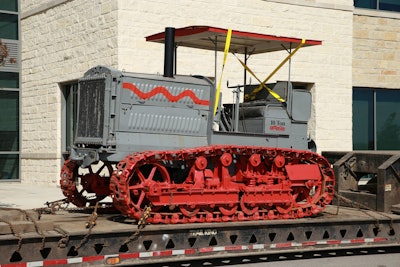 Holt Caterpillar 10-Ton tractor loaded on a flatbed trailer