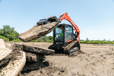 Kubota cc30 concrete claw attached to compact track loader