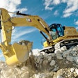 Cat 374 excavator at construction site