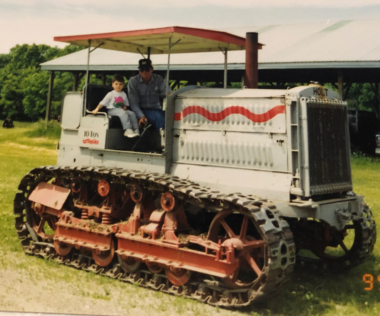 Scott Vouk at age 4 gets a ride on the Holt Caterpillar 10-Ton.