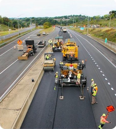 construction crew paving highway