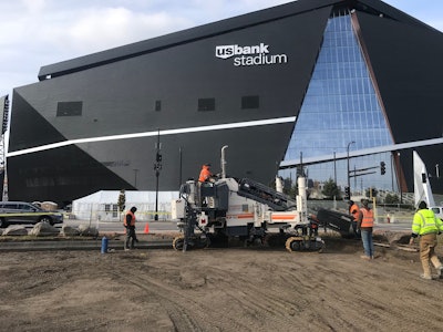 Goodmanson Construction workers working outside of U.S. Bank Stadium
