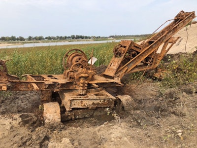 A view of the old shovel at the emptied Wixom Lake after zebra mussels have been removed along with the boiler and water tank.