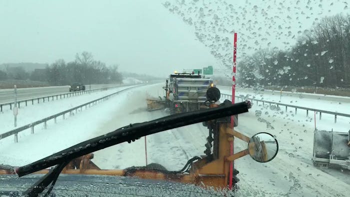 new york state DOT using snow plow on highway