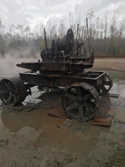 The old thew Type-O steam shovel gets a power-wash after sitting at the bottom of Wixom Lake for 95 years.