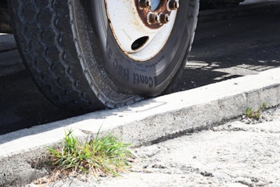 tire hitting the curb