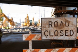 Road closed sign on construction site