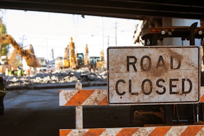 Road closed sign on construction site