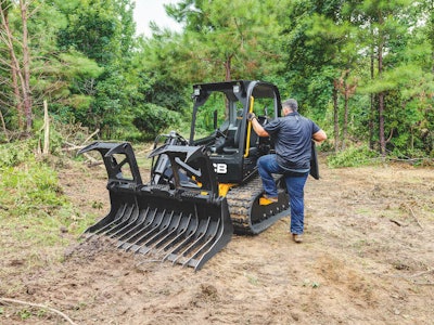 man climbing into jcv 270t equipment