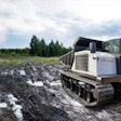 Prinoth equipment in muddy field