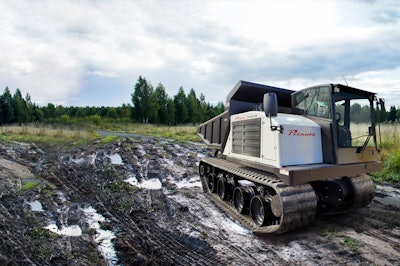 Prinoth equipment in muddy field