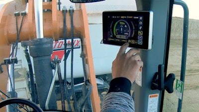 hand touching payload system inside case wheel loader