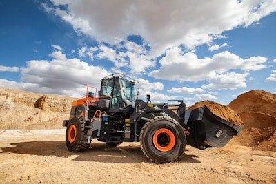 Doosan wheel loader carrying dirt