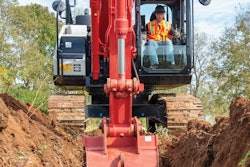 construction worker operating equipment