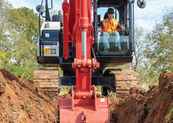 construction worker operating equipment