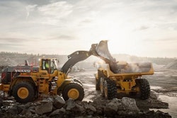 Man operating volvo wheel loader