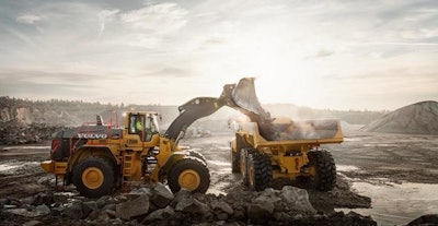 Man operating volvo wheel loader