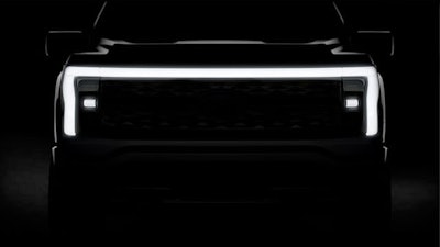 Grille of the all-electric F-150 teased recently by Ford. No doubt, prominent illumination like that will command attention and maybe plenty of sales as well.