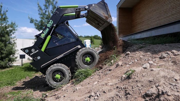 kovaco skid steer dumping dirt