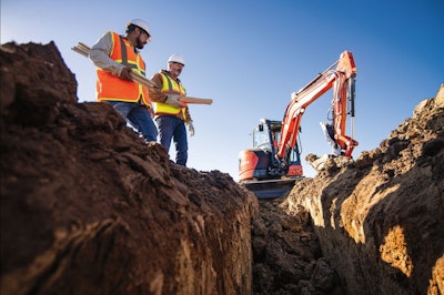 Kubota U48-5 excavator digging on jobsite